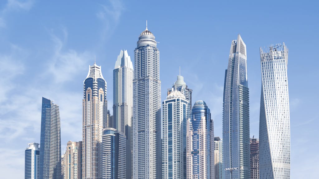 Stunning view of Dubai's iconic skyscrapers under a clear blue sky.